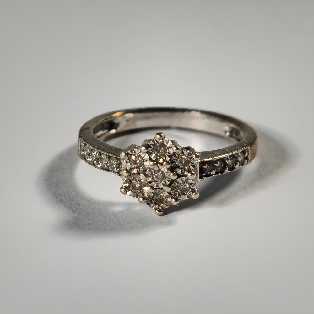 Product photo for 9ct White Gold 0.15ct tiny Diamond Flower Ring Size J