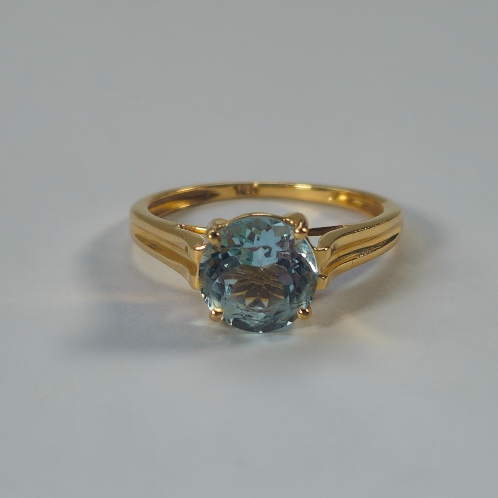 Product photo for 18ct Gold Round Aqua Blue Stone 4 Claw Engagement Style Ring Size N