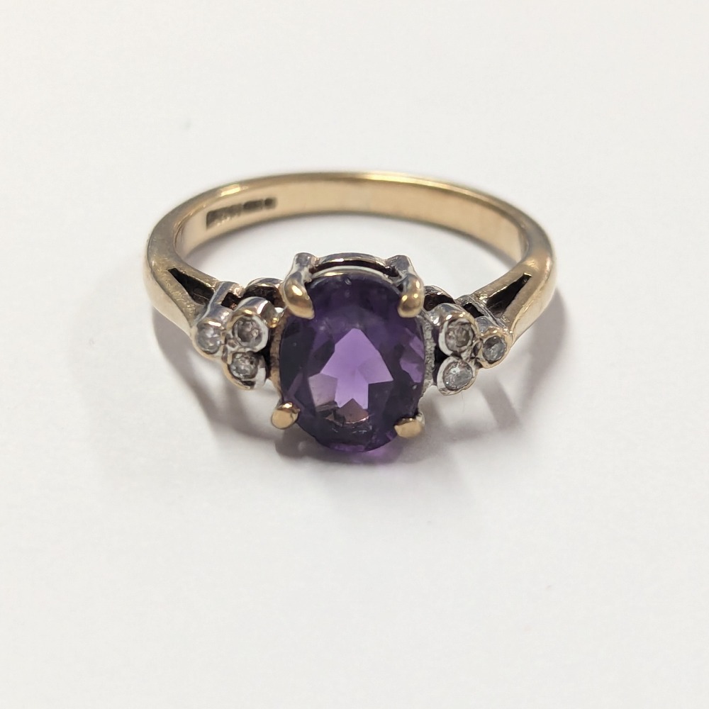 Product photo for 9ct Gold 1 Oval Purple Stone & 3x2 Sparkly Diamond Ring Size J