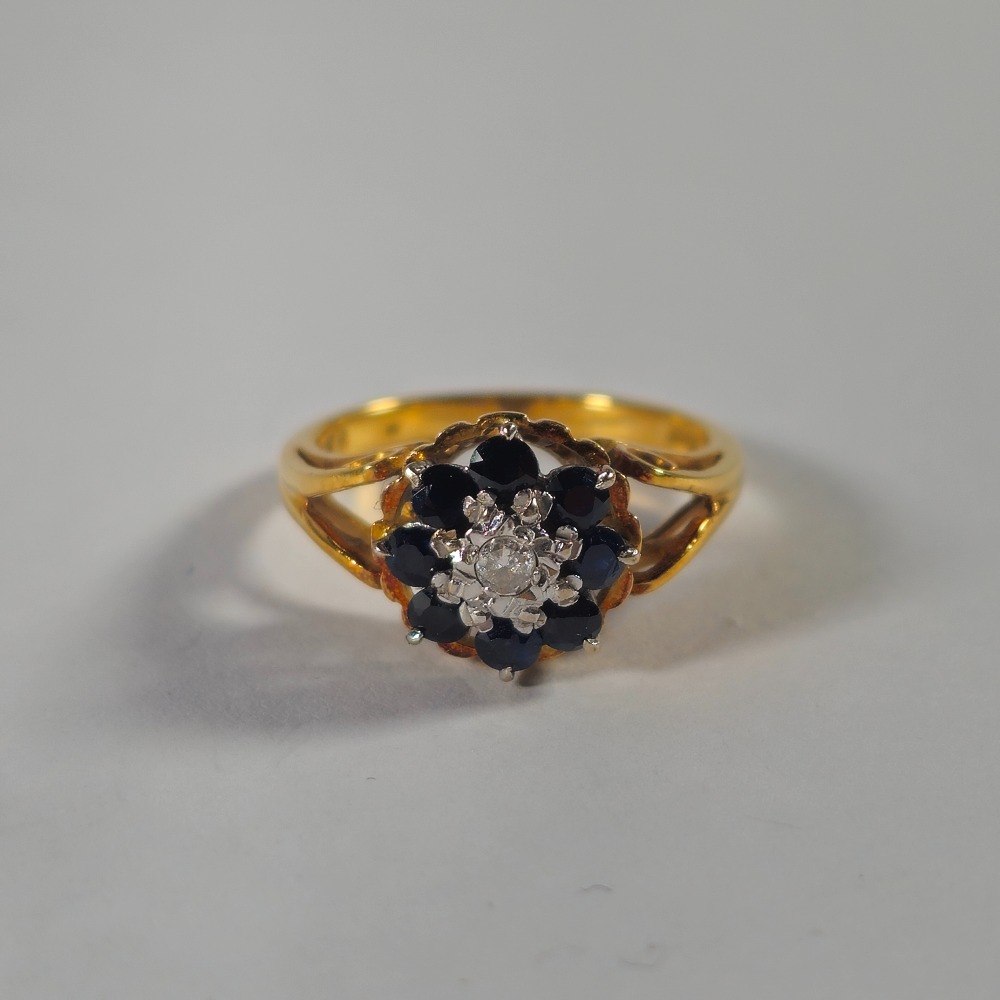 Product photo for 18ct Gold Diamond & Blue Sapphire Flower Ring Size K