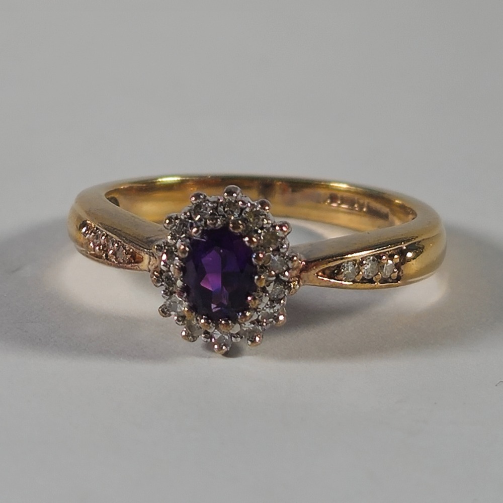 Product photo for 9ct Gold Oval Rich Purple Amethyst & tiny Diamond Flower Ring Size L