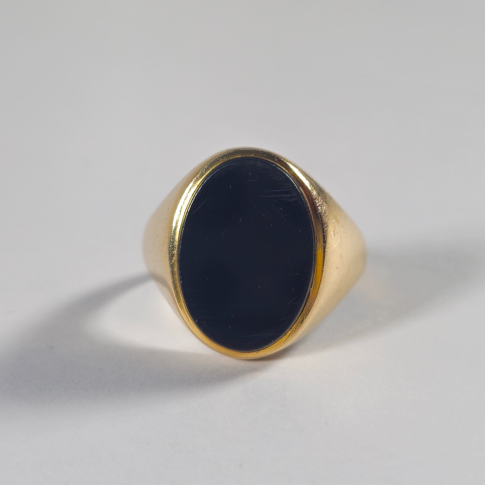 Product photo for 9ct Gold Oval Black Stone Signet Ring Size T