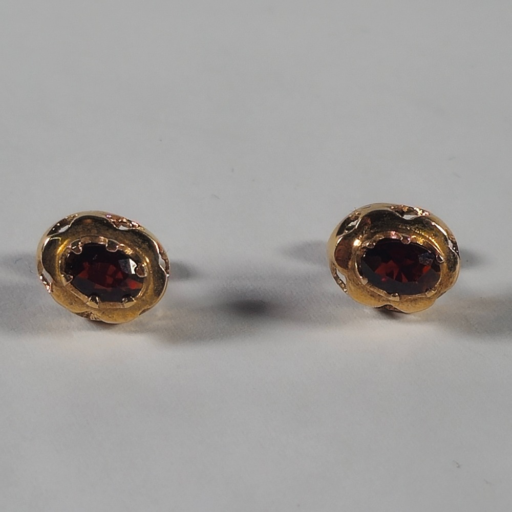 Product photo for 9ct Gold Oval Red Garnet Stud Earrings, 1.95g