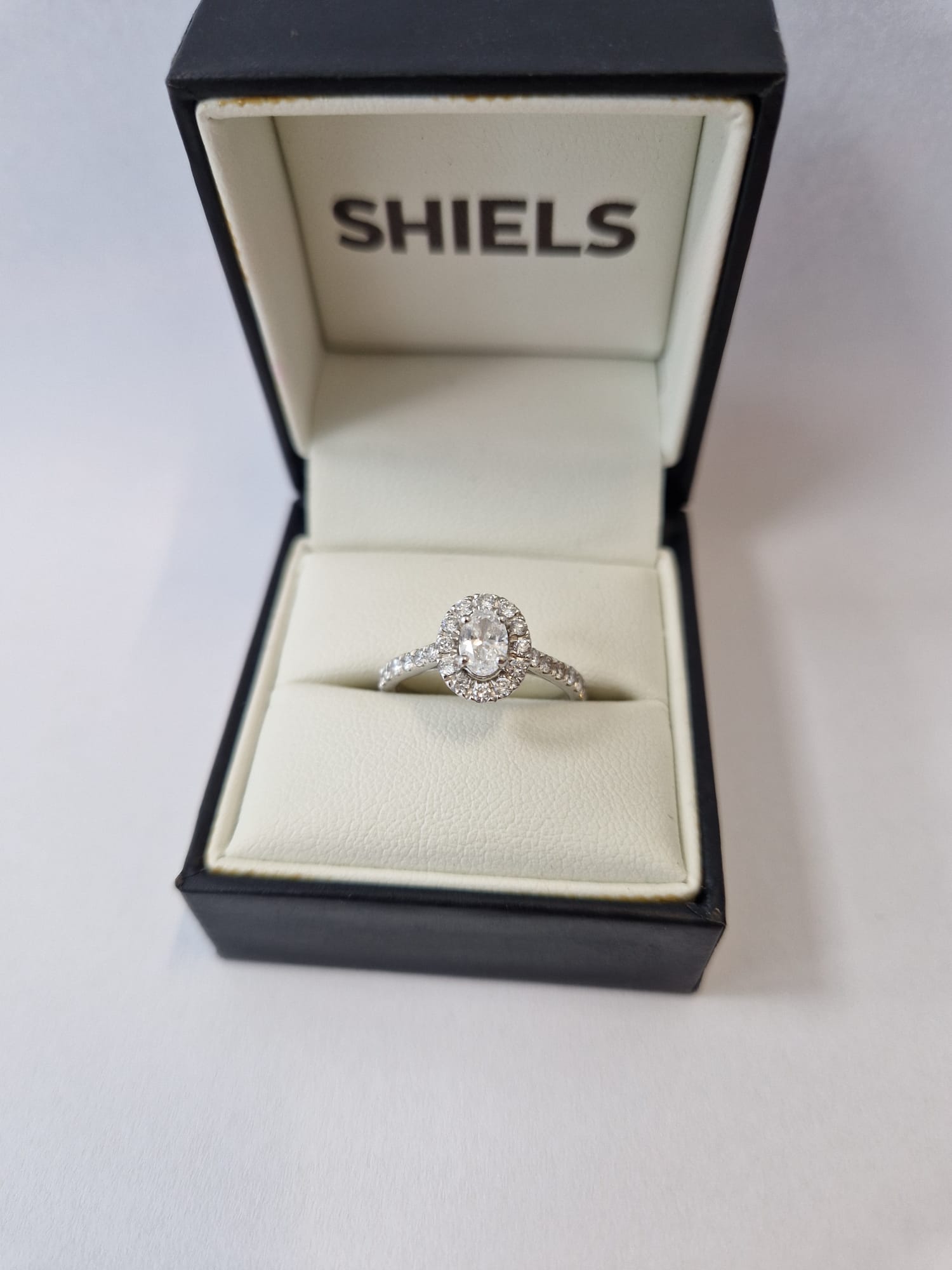 Product photo for Shiels  Luminesce Lab Grown Diamond Halo Ring 9ct White Gold Size M Boxed