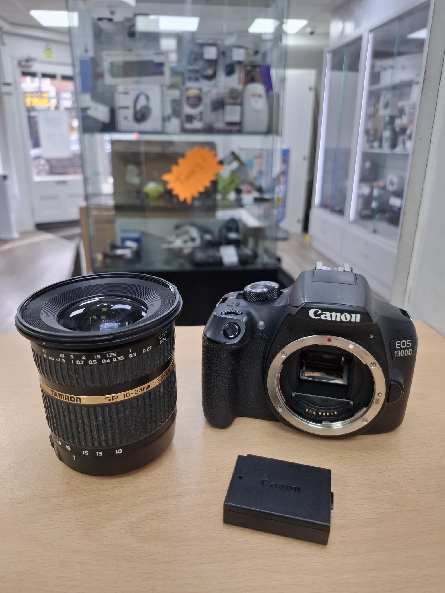 Product photo for Canon EOS 1300D 18.0MP Digital Camera DSLR + Tamron SP 10-21mm - DAMAGED