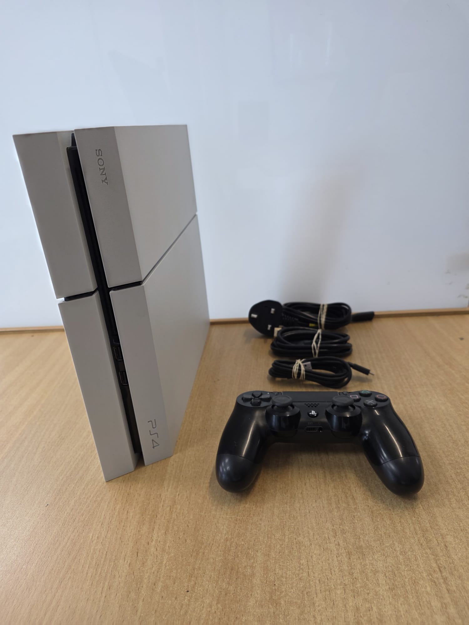 Product photo for Sony PlayStation 4 500GB Glacier White Console With Controller