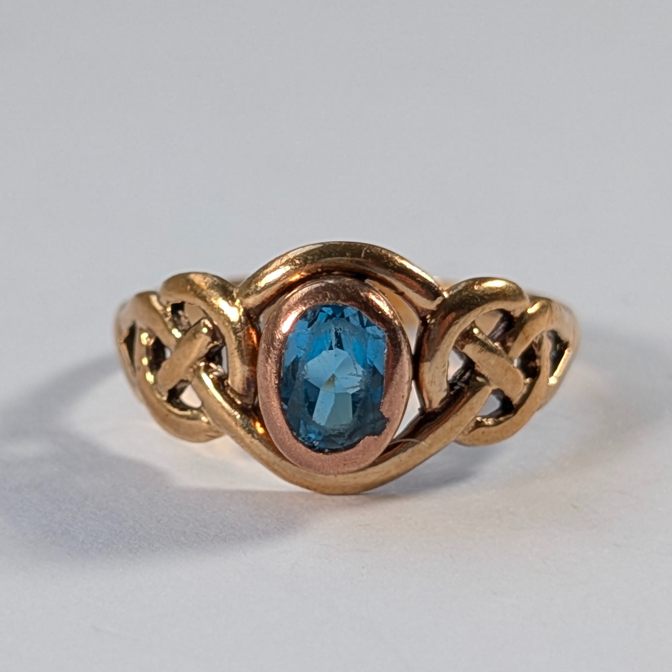 Product photo for Clogau Oval Blue Topaz Celtic Ring Size P1/2
