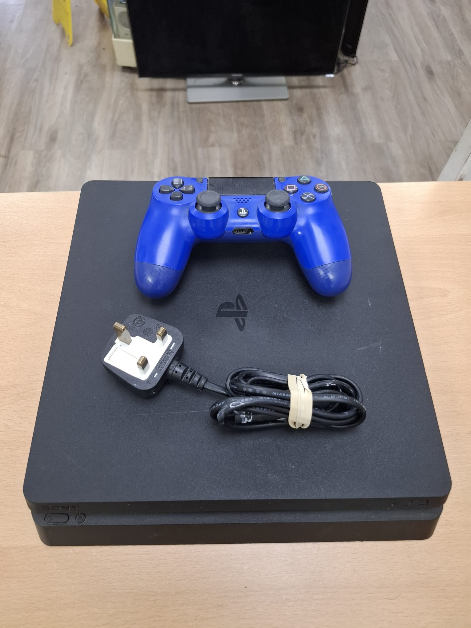 Product photo for Sony PlayStation 4 Slim 500GB Black – 1 Controller