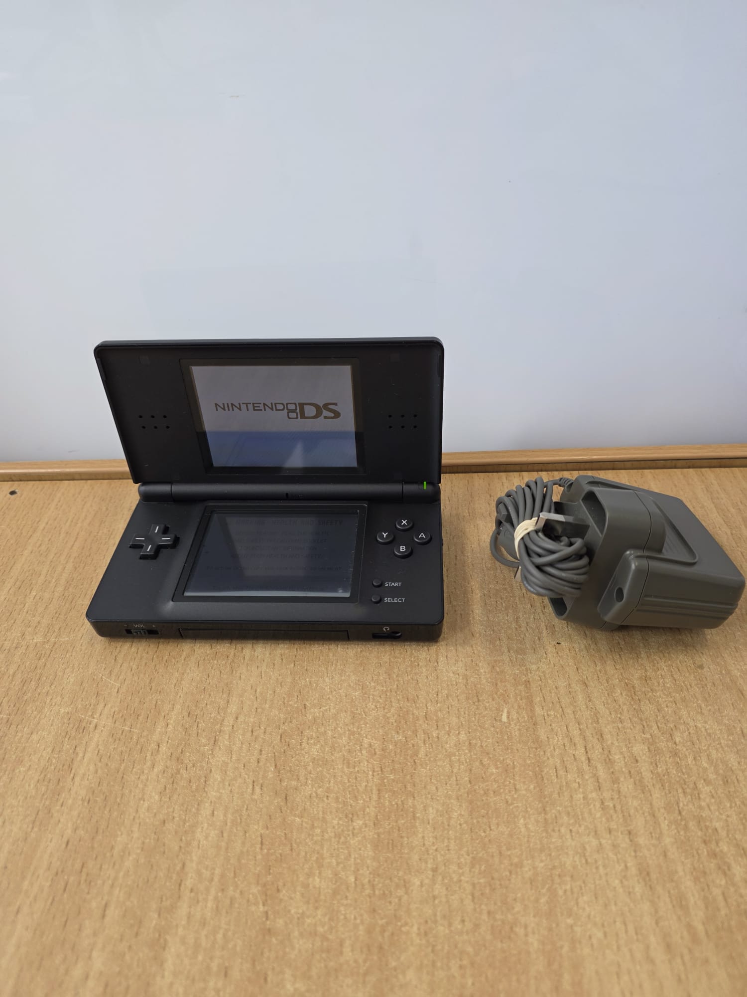 Product photo for Nintendo DS Lite Black Official Charger Very Good Condition