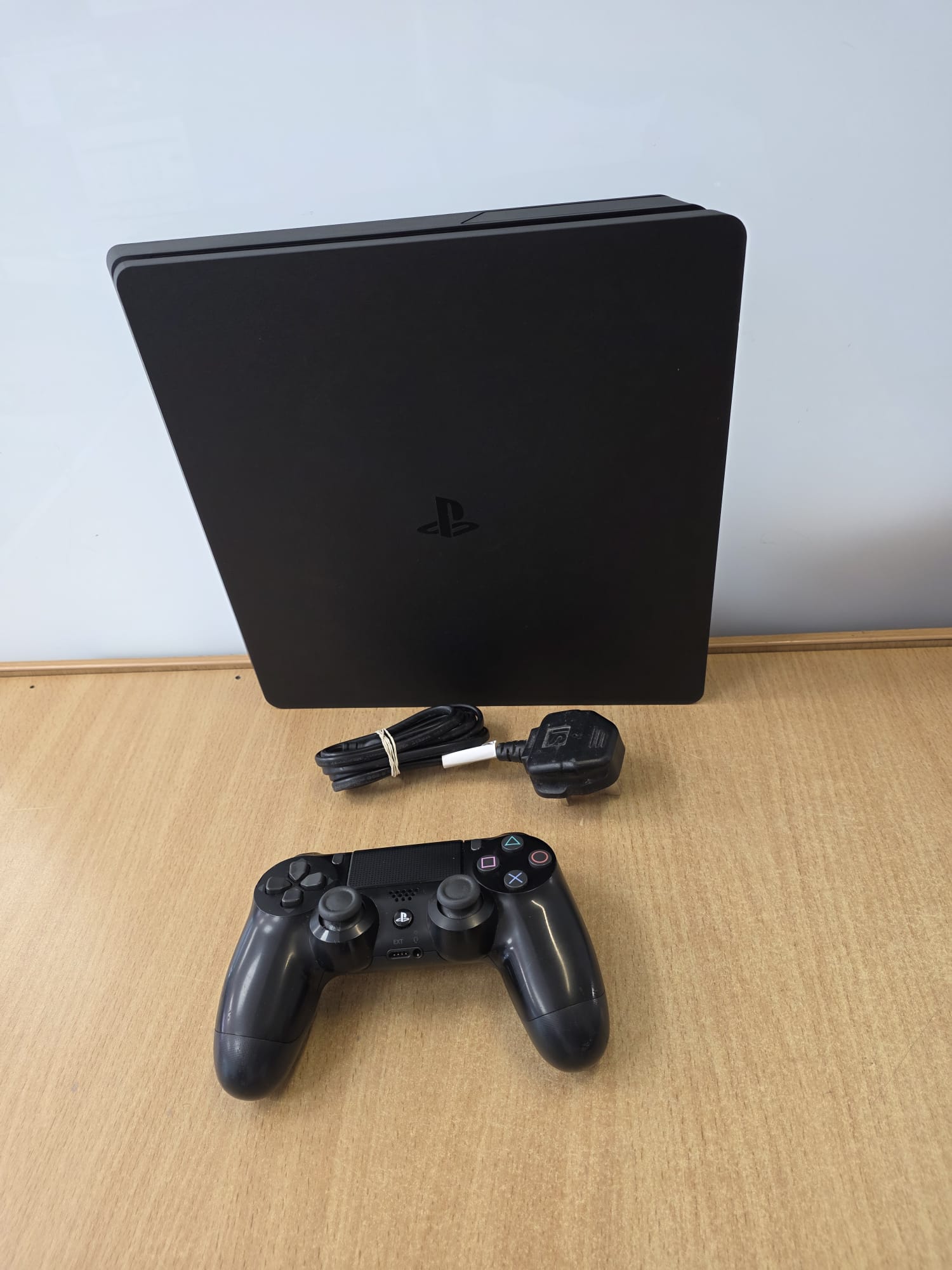 Product photo for Sony PlayStation 4 Slim 500GB Console Official Controller