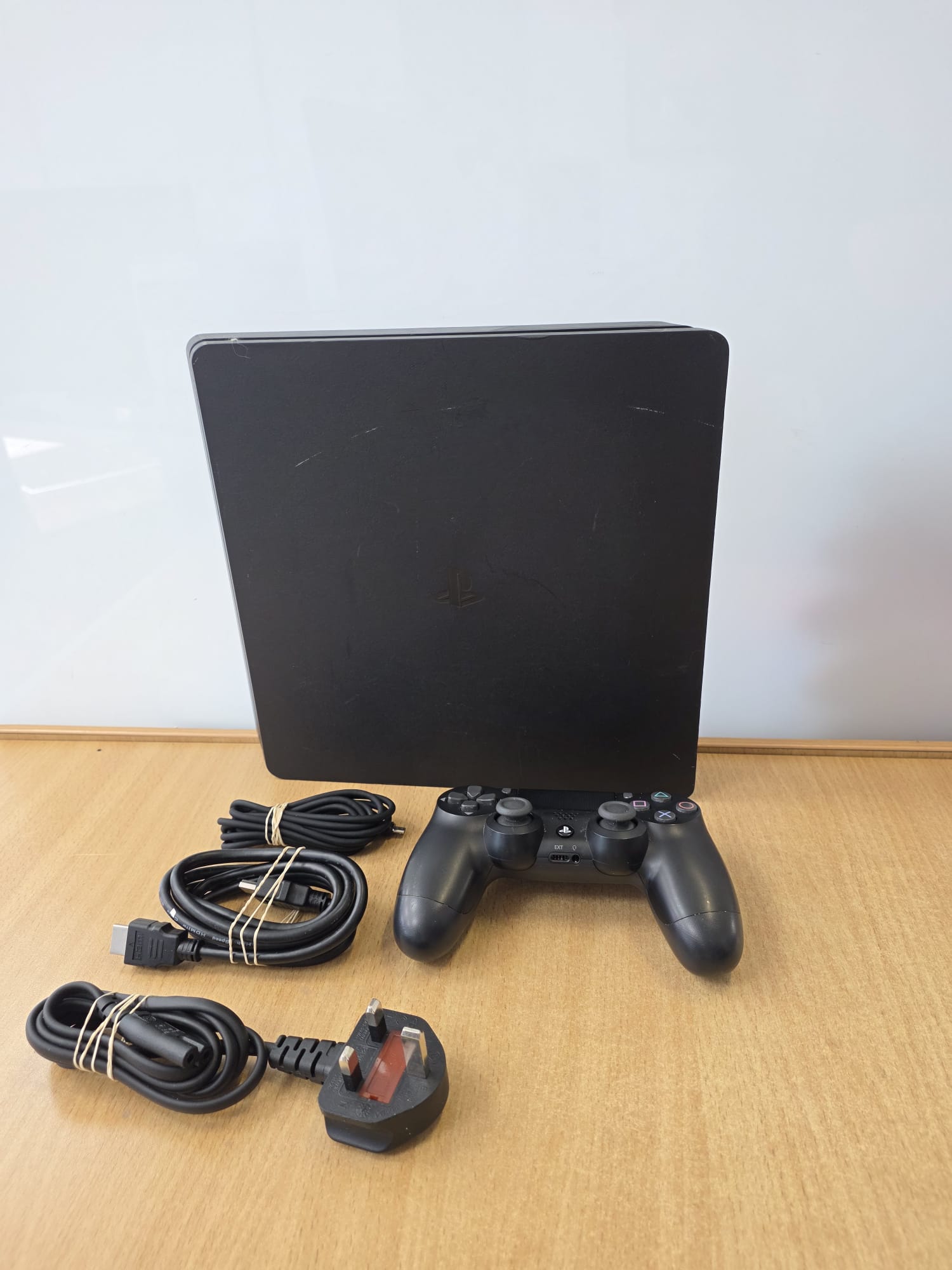 Product photo for Sony PlayStation 4 Slim 500GB Console Controller Cables Included